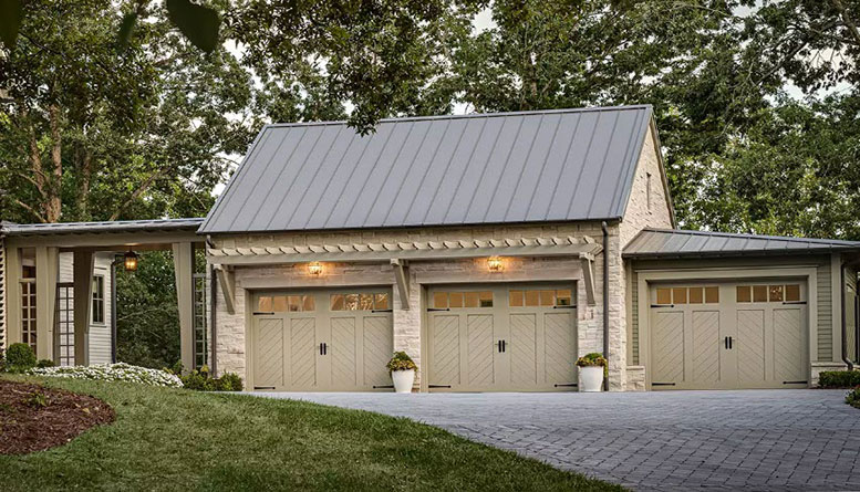 Example of a Greensboro home with a Clopay Canyon Ridge Chevron door