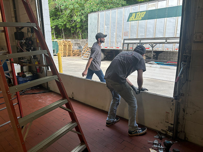 commercial dock door repair at Madison facility